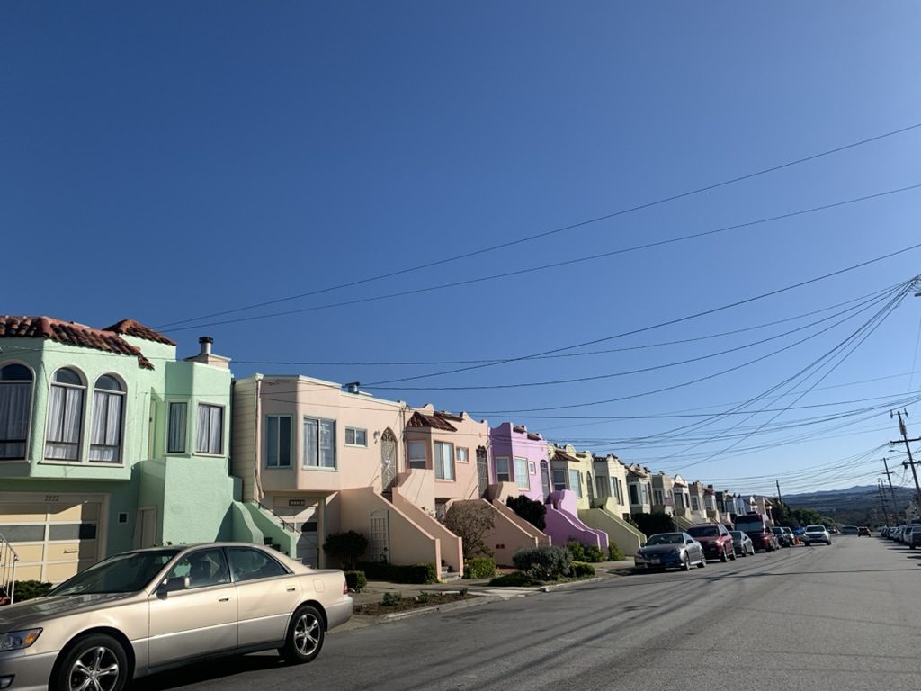 Rows of homes on a residential street in San Francisco's Sunset District.