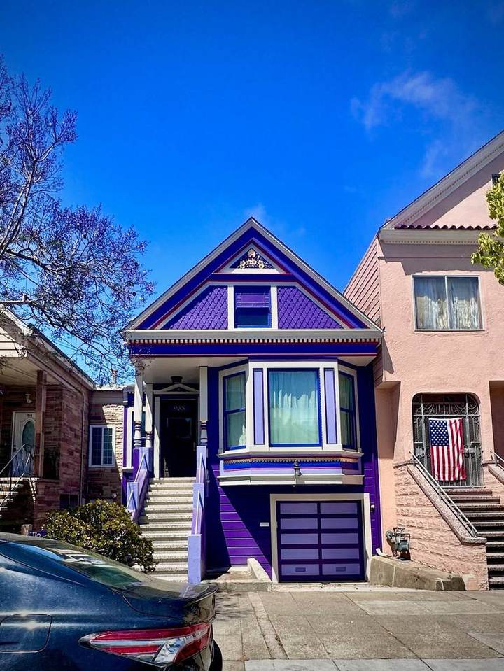 Queen Anne cottage painted in shades of purple