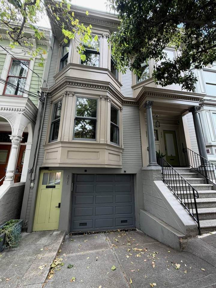 Grey Edwardian with bay window, garage and separate side entrance